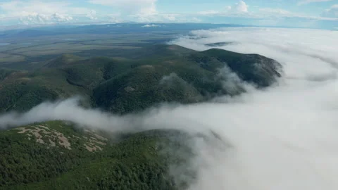 Aerial view of clouds and mountains in the national park Stock Footage 229024743