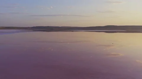 Aerial view clouds and sky reflection in pink lake water Stock Footage 118741155