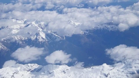 Aerial View of Clouds and Snow-Capped Mountains Stock Footage 77796385