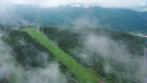 Aerial view from the clouds on the beautiful forests of the Czech Republic Stock Footage 148045929