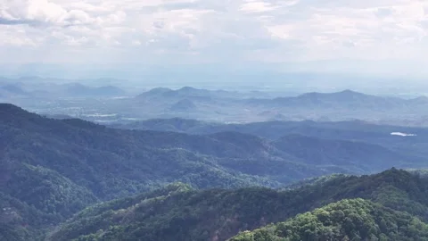 Aerial view of clouds covered mountains and valleys in Chiang Mai region Stock Footage 309439724