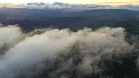 Aerial View of Clouds Drifting Above Bay Area Hills in California Stock Footage 106101850