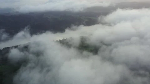 Aerial View of Clouds Drifting Over Northern California Landscape Stock Footage 164882383
