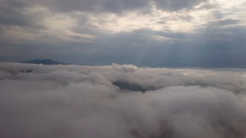 Aerial view of clouds in a mountainous region of Slovakia, Tatra Mountains Stock Footage 129369514
