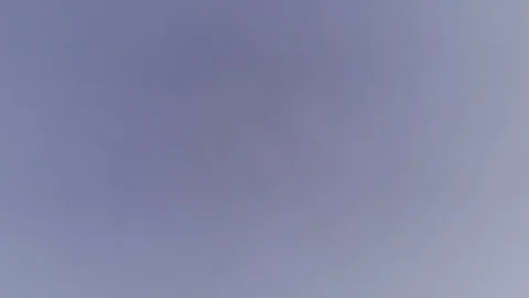 Aerial view in the clouds in the mountains above the snowy forest Stock Footage 122173396