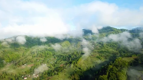 Aerial view of clouds in the mountains Stock Footage 120534829