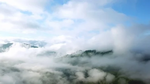 Aerial view of clouds in the mountains Stock Footage 121172519