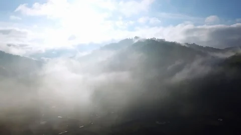 Aerial view of clouds in the mountains Stock-Footage 121689064
