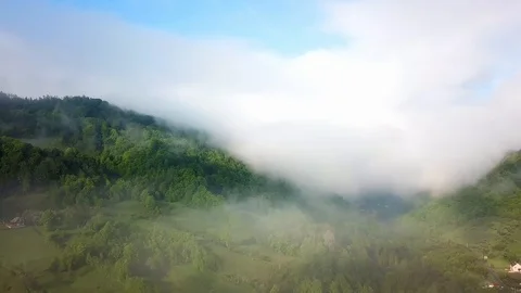 Aerial view of clouds in the mountains Stock Footage 122685408