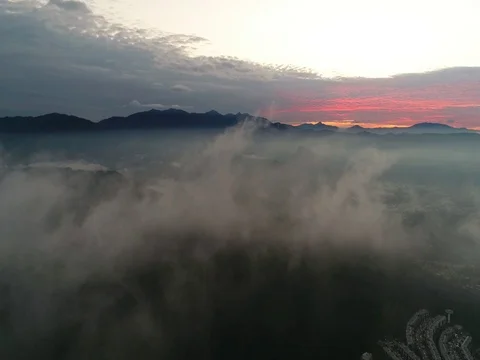 Aerial view. Clouds moving and sun rise over the mountain in beautiful color. Видео 81108846