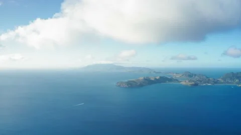 Aerial view of clouds moving over a hilly island in Saint Kitts and Nevis Video stock 136405065
