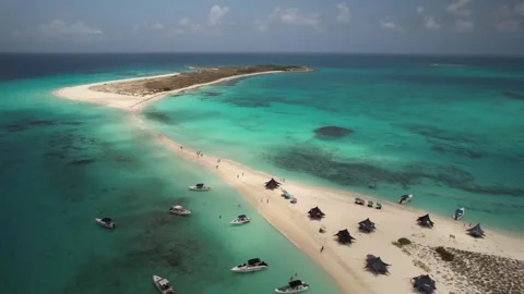 Aerial view of clouds moving over Cayo de Agua tropical sandbar Stock Footage 340885899