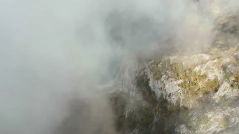 Aerial view clouds over Lake in canyon Stock Footage 232273035