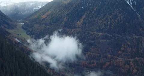Aerial view clouds over Mountain near Martigny in Canton Valais Vidéo 120515027