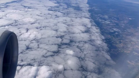 Aerial View of Clouds Over Patchwork Farmland and Countryside From an Airpl.. Stock Footage 347483168