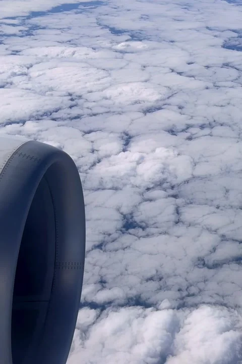 Aerial View of Clouds Over Patchwork Farmland and Countryside From an Airpl.. Stock Footage 347483392