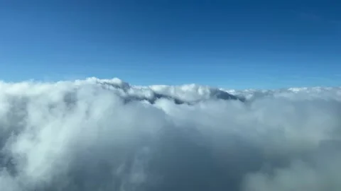Aerial view of clouds. Pilot point of view, flying through clouds during Stock Footage 231858720