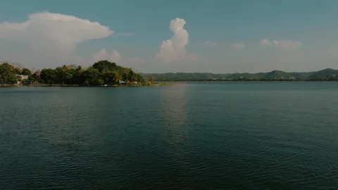 Aerial View of Clouds Reflecting on Lago Petén Itzá, Flores Island, Guatemala Stock Footage 340036503