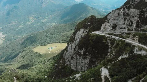 Aerial view in a cloudy and foggy day near Italian mountains. Stock Footage 135080098