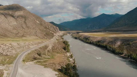 Aerial view cloudy day view road near river surrounded altay mountains Stock Footage 200780550
