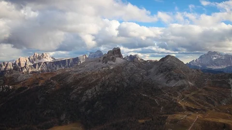 Aerial view of cloudy mountain valley in Dolomites Alps Stock Footage 91929694