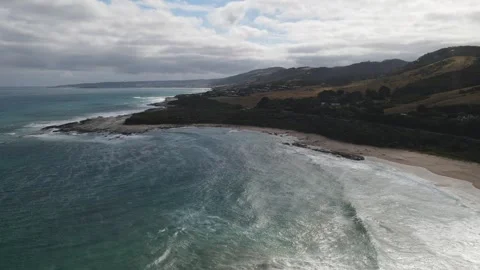 Aerial view of cloudy ocean bay and scenic coastline Stock Footage 336007384