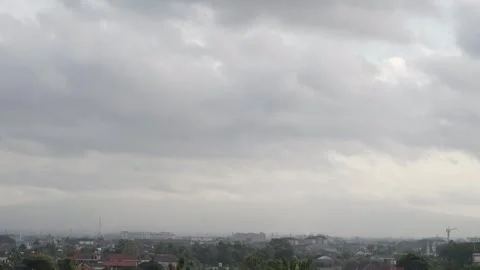 Aerial view of the cloudy sky over the city. time lapse view of the city skyline Stock Footage 259937380