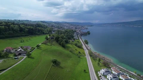 Aerial view on a cloudy summer day in Richterswil by the lake of Zurich Stock Footage 190465427