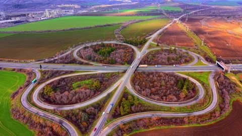 Aerial view of a cloverleaf highway interchange Stock Footage 329623858
