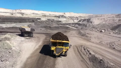 Aerial view of coal-carrying machine in a coal mine Stock Footage 294098978
