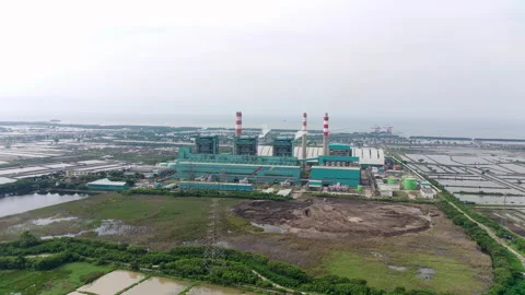 Aerial view of a coal-fired power plant company with a view of the surrounding Stock Footage 209163471