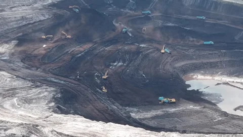 Aerial view of coal loading and unloading activities at a coal mine in a mi.. Stock Footage 337812715