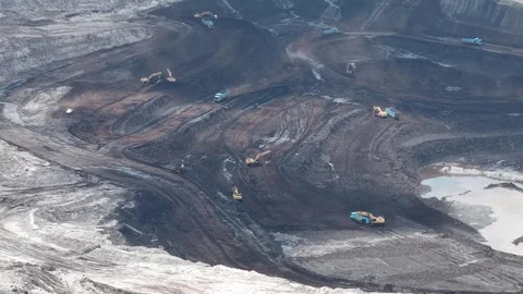 Aerial view of coal loading and unloading activities at a coal mine in a mi.. Stock Footage 337812768