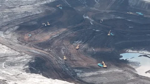Aerial view of coal loading and unloading activities at a coal mine in a mi.. Stock Footage 337812793
