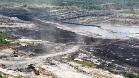 Aerial view of coal mining activities, haul trucks Stock Footage 338312648