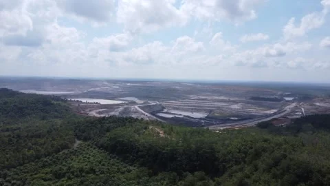 Aerial view of coal mining on Kalimantan Island Stock Footage 314271474