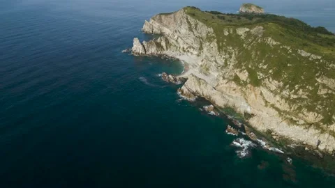 Aerial view, Coast, Rock's Cliffs, Mountains, Pacific Ocean, Sunrise Stock Footage 163094812