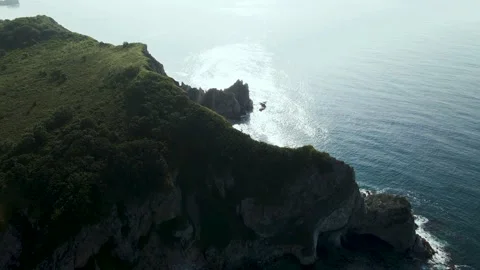 Aerial view, Coast, Rock's Cliffs, Mountains, Pacific Ocean, Sunset Stock Footage 163094851