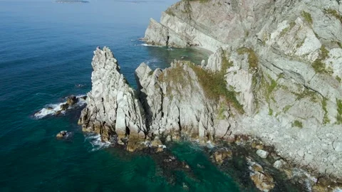 Aerial view, Coast, Rock's Cliffs, Stones, Pacific Ocean, Afternoon Stock Footage 163094932