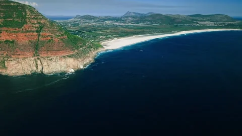 Aerial view of coastal cliff face from a low approach angle Stock Footage 340559226