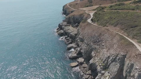Aerial View of Coastal Cliffs and Winding Footpath near Swanage Dorset UK Stock Footage 342769413