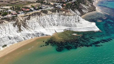 Aerial view of coastal cliffs with white rock formations, sandy beach Stock Footage 345149062