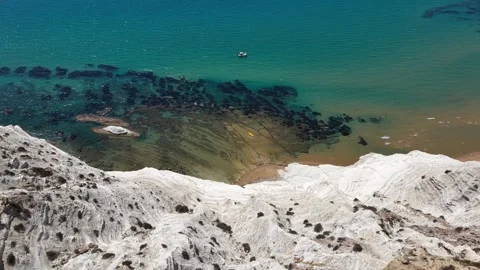 Aerial view of coastal cliffs with white rock formations, sandy beach Stock Footage 345149251