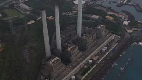 Aerial view of a coastal coal fired power plant Video stock 329623749