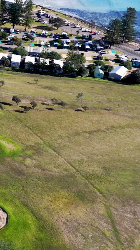 Aerial View of Coastal Golf Course and Caravan Park in Crescent Head Stock Footage 342720827