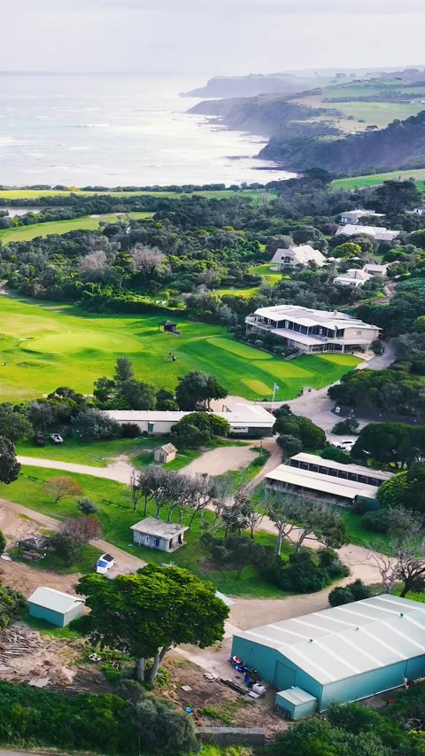Aerial View of Coastal Golf Course and Ocean in Flinders Stock Footage 345699823