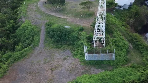 Aerial View of Coastal Lighthouse Tower on Cliff Near Sea Coast Stock Footage 340489729
