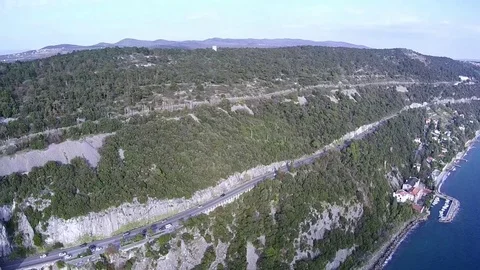 Aerial view of Coastal road. Drone flying along coast near Trieste Italy Stock Footage 80908129
