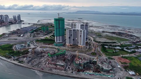 Aerial View of Coastal Urban Development with New High-Rise Buildings Stock Footage 341720730