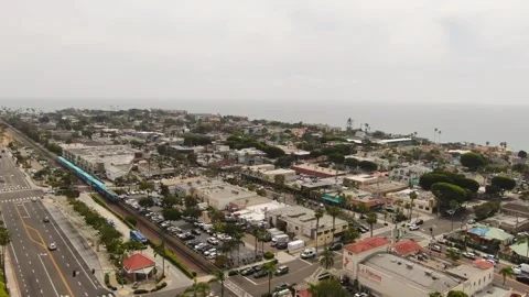 Aerial View of the COASTER Train Passing Through Encinitas CA Stock Footage 332541097